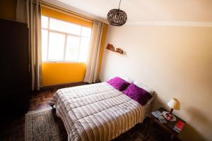 Postel nebo postele na pokoji v ubytování Casa de Viajeros