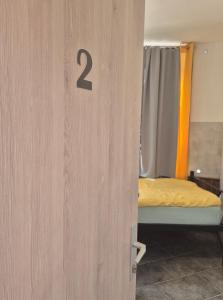 Postel nebo postele na pokoji v ubytování Bled Lesce station rooms and beds