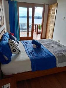 Postel nebo postele na pokoji v ubytování Casa del Cielo