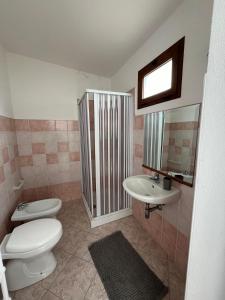 Koupelna v ubytování Casa Vacanze Tra gli Olivi