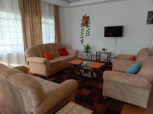 Posezení v ubytování The kioka gardens 2 bedroom Ensuites + 11 fotografií