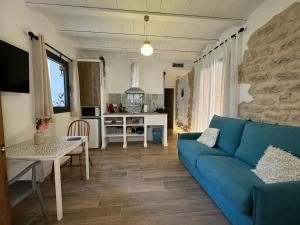 TV a/nebo společenská místnost v ubytování Casa Don Pelayo Boutique Apartments & Café