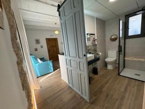 Koupelna v ubytování Casa Don Pelayo Boutique Apartments & Café + 73 fotografií