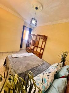 Ένα ή περισσότερα κρεβάτια σε δωμάτιο στο Residence Ethan Nji - Amazing loft +15 φωτογραφίες