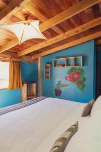 Ένα ή περισσότερα κρεβάτια σε δωμάτιο στο Doña Catta Casa Boutique