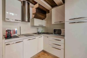 Köök või kööginurk majutusasutuses Loft Elegante in Centro Milano In zona Signorile - Davanti alla Metro