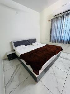 Katil atau katil-katil dalam bilik di Rudraksh Homestay