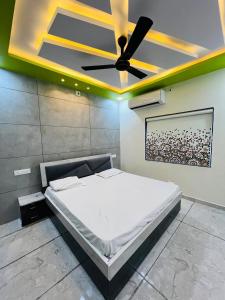 Katil atau katil-katil dalam bilik di Rudraksh Homestay