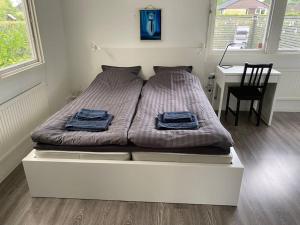 Postel nebo postele na pokoji v ubytování Guesthouse