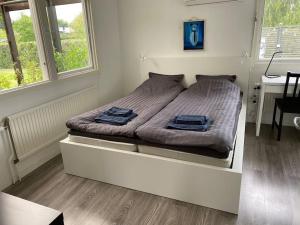 Postel nebo postele na pokoji v ubytování Guesthouse