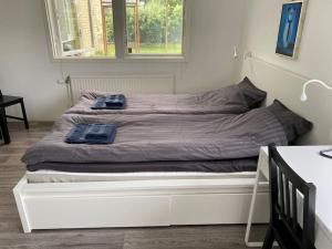 Postel nebo postele na pokoji v ubytování Guesthouse
