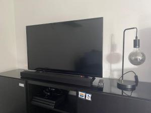 TV a/nebo společenská místnost v ubytování Guesthouse