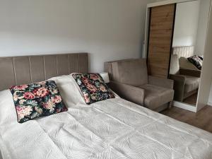 Posteľ alebo postele v izbe v ubytovaní BTS Apartaments - Apartamenty Blisko Morza