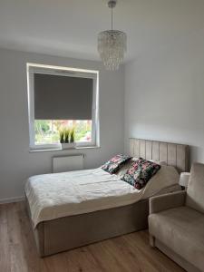 Posteľ alebo postele v izbe v ubytovaní BTS Apartaments - Apartamenty Blisko Morza