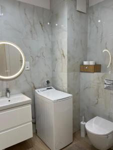 Kúpeľňa v ubytovaní BTS Apartaments - Apartamenty Blisko Morza