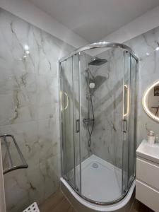 Kúpeľňa v ubytovaní BTS Apartaments - Apartamenty Blisko Morza