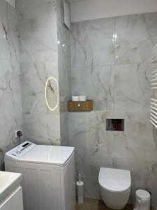 Kúpeľňa v ubytovaní BTS Apartaments - Apartamenty Blisko Morza