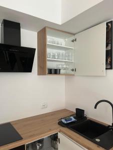 Kuchyňa alebo kuchynka v ubytovaní BTS Apartaments - Apartamenty Blisko Morza
