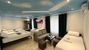 Ліжко або ліжка в номері Hotel Davids