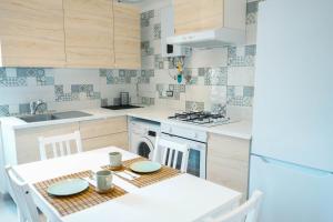 Kuchyň nebo kuchyňský kout v ubytování Salotto Tiburtino