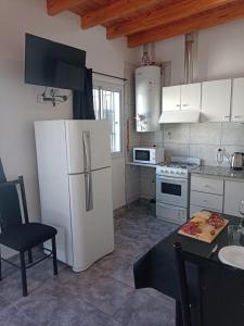 Η κουζίνα ή μικρή κουζίνα στο RyM Departamentos