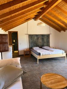 Postel nebo postele na pokoji v ubytování Moinhos do Paneiro, Studio IDA without kitchen, sea view