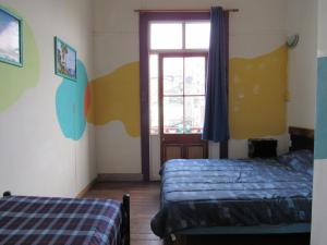Postel nebo postele na pokoji v ubytování Valparadise Hostel