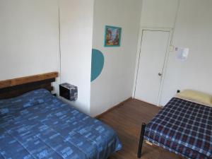 Postel nebo postele na pokoji v ubytování Valparadise Hostel