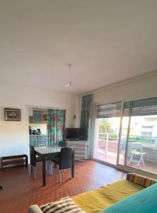 Χώρος καθιστικού στο Le Neptune place de Marbre plage et port