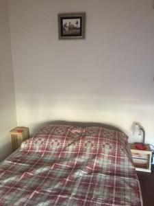 Ένα ή περισσότερα κρεβάτια σε δωμάτιο στο Le Neptune place de Marbre plage et port