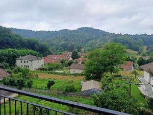 a view of a town with a mountain at Grazioso bilocale in Giusvalla