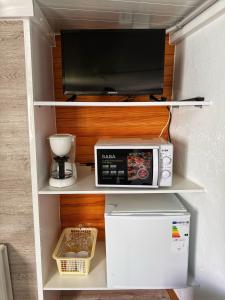 Una cocina o zona de cocina en Habitación Namasté 15 fotos más