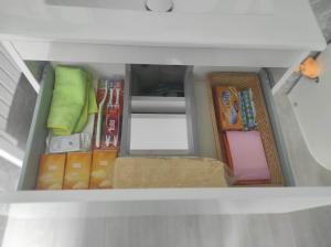 a box filled with lots of food and other items at Habitación Namasté in Playa Blanca