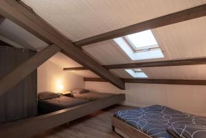 Łóżko lub łóżka w pokoju w obiekcie Appartement luxe Cannes centre à côté du Palais