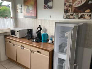 Kuchyň nebo kuchyňský kout v ubytování Linnemanns Gaestehaus