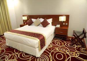 Postel nebo postele na pokoji v ubytování Wow Hotel Jeddah