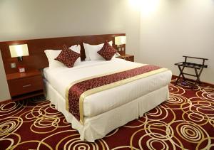 Postel nebo postele na pokoji v ubytování Wow Hotel Jeddah