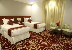 Postel nebo postele na pokoji v ubytování Wow Hotel Jeddah