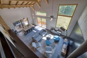 Posezení v ubytování Chalet mitoyen - Jacuzzi - Cousinade I