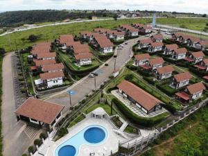 an aerial view of a house with a pool at Chalé Paisagem Serrana in Bananeiras