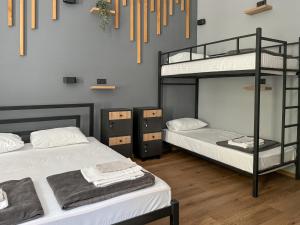 Postel nebo postele na pokoji v ubytování Apartments White Pearl Sadova
