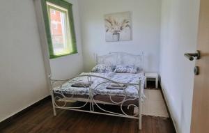 Posteľ alebo postele v izbe v ubytovaní Apartman Lena