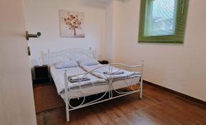 Posteľ alebo postele v izbe v ubytovaní Apartman Lena