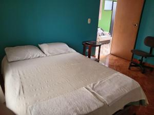 Letto o letti in una camera di Guaxique