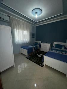 Postel nebo postele na pokoji v ubytování Abraj Dubai 3 bedroom luxury apartment