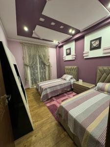 Postel nebo postele na pokoji v ubytování Abraj Dubai 3 bedroom luxury apartment