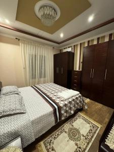 Postel nebo postele na pokoji v ubytování Abraj Dubai 3 bedroom luxury apartment