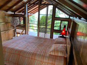 Postel nebo postele na pokoji v ubytování L'Oasis Don Juan