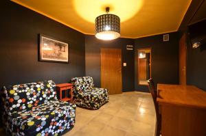 Posezení v ubytování Hotel Dworek nad Regą