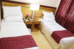 Cama ou camas em um quarto em Wahet Al Deafah Hotel